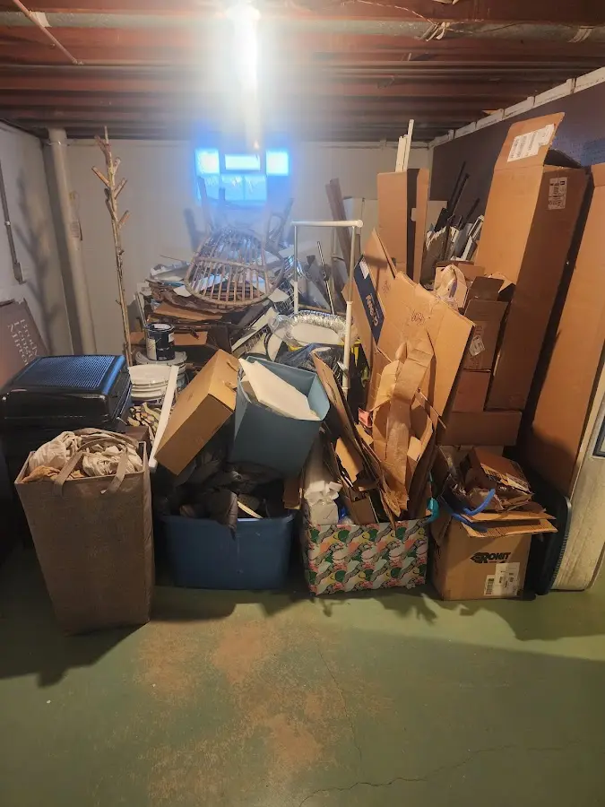 Roll-off dumpster container at job site for 4 Yard Dumpster Rental in Highland Lakes